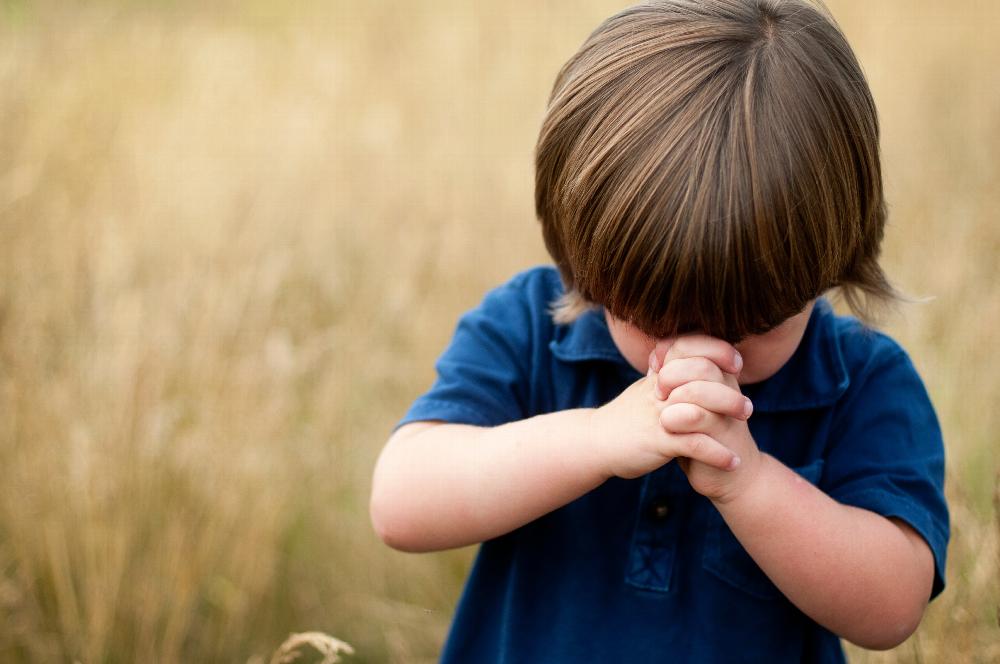 child praying